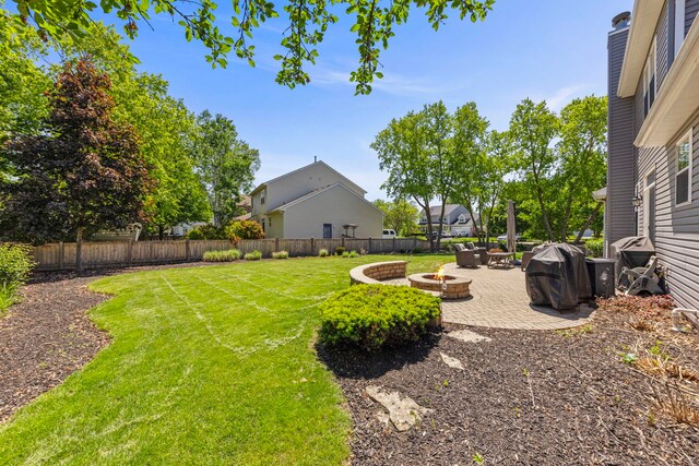 401 Manchester Rd, Oswego, IL 60543 - view of yard with an outdoor fire pit and a patio area