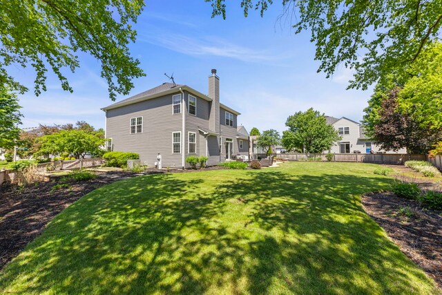 401 Manchester Rd, Oswego, IL 60543 - back of property with a chimney