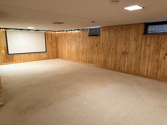 6600 N Kenton Ave, Lincolnwood, IL 60712 - finished basement with wood walls, carpet floors, and baseboards