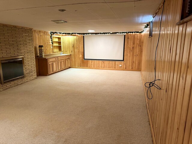 6600 N Kenton Ave, Lincolnwood, IL 60712 - home theater room with carpet, wooden walls, and a fireplace
