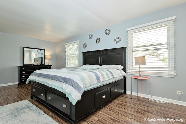 716 Lagoon Ter, Round Lake Beach, IL 60073 - bedroom with wood finished floors and baseboards