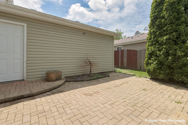 716 Lagoon Ter, Round Lake Beach, IL 60073 - view of patio / terrace featuring fence