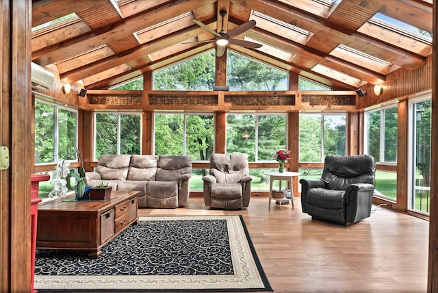 19423 Lakeside Ln, Bloomington, IL 61705 - sunroom / solarium with wood finished floors, a skylight, a wall mounted air conditioner, and a deck