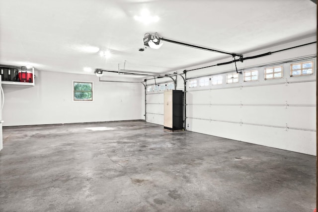 19423 Lakeside Ln, Bloomington, IL 61705 - garage featuring a garage door opener