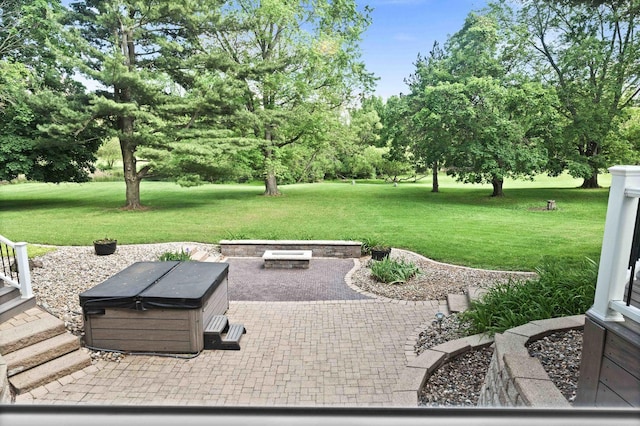 19423 Lakeside Ln, Bloomington, IL 61705 - view of patio / terrace featuring a hot tub and view of scattered trees