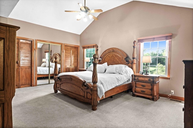 19423 Lakeside Ln, Bloomington, IL 61705 - bedroom with carpet flooring, multiple closets, multiple windows, and high vaulted ceiling