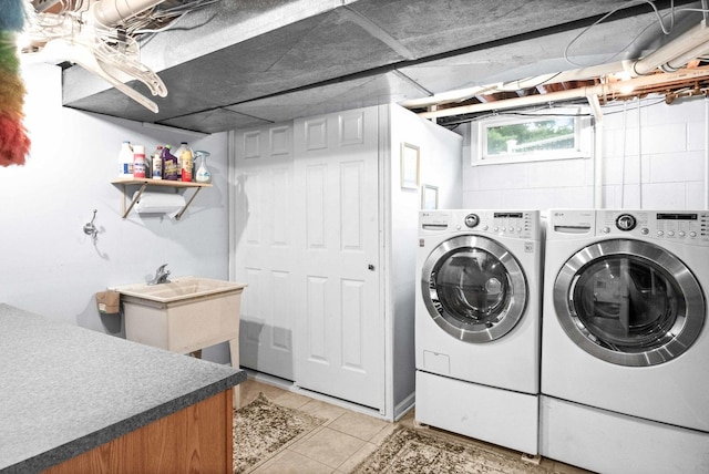 19423 Lakeside Ln, Bloomington, IL 61705 - washroom with washing machine and clothes dryer and light tile patterned floors