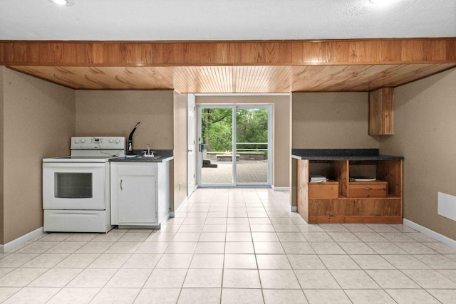 19423 Lakeside Ln, Bloomington, IL 61705 - kitchen featuring white electric stove, baseboards, dark countertops, wooden ceiling, and light tile patterned flooring