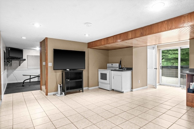 19423 Lakeside Ln, Bloomington, IL 61705 - kitchen with electric stove, baseboards, light tile patterned floors, and recessed lighting