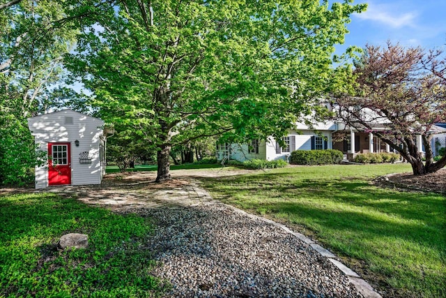 19423 Lakeside Ln, Bloomington, IL 61705 - view of grassy yard featuring an outdoor structure