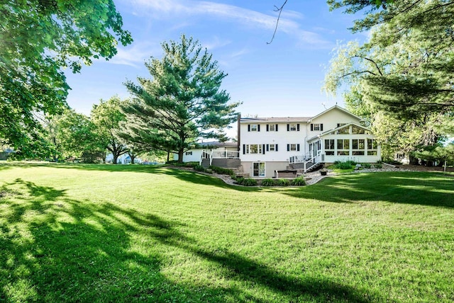 19423 Lakeside Ln, Bloomington, IL 61705 - view of green lawn featuring a sunroom