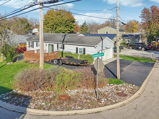 35634 N Greenleaf Ave, Ingleside, IL 60041 - view of home's exterior with driveway and a wooden deck
