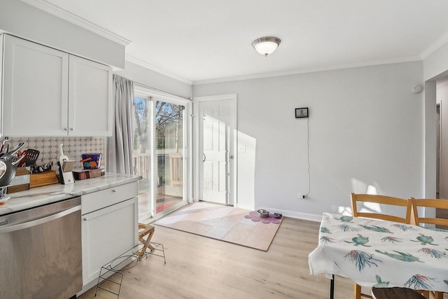 35634 N Greenleaf Ave, Ingleside, IL 60041 - kitchen featuring stainless steel dishwasher, backsplash, ornamental molding, white cabinets, and light wood-style floors