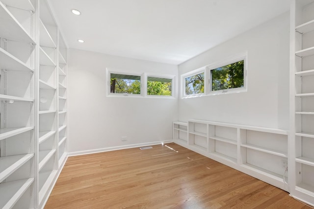 9032 Crawford Ave, Skokie, IL 60076 - empty room featuring wood finished floors, baseboards, and recessed lighting