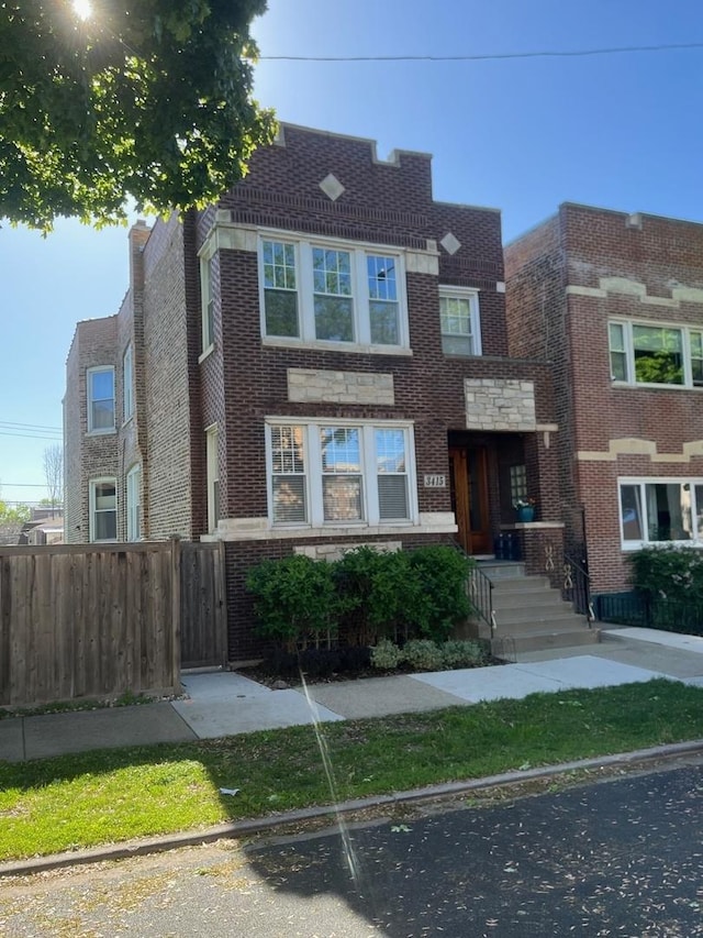 3415 S Emerald Ave, Chicago, IL 60616 - view of front facade featuring brick siding