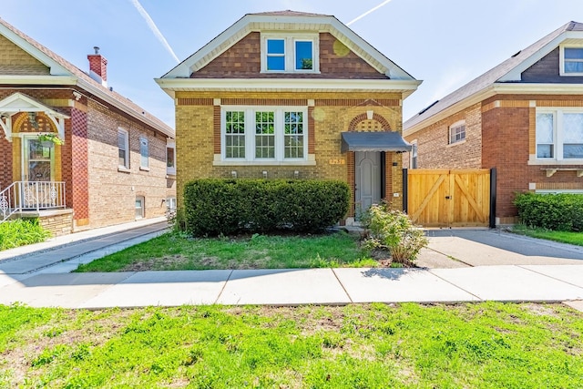 2531 Grove Ave, Berwyn, IL 60402 - view of front of property with brick siding, a gate, and fence