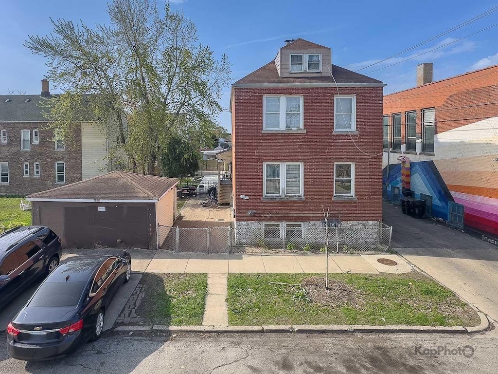 2800 S Lawndale Ave, Chicago, IL 60623 - view of property exterior featuring brick siding and fence