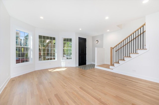 1542 W Highland Ave, Chicago, IL 60660 - entrance foyer featuring plenty of natural light, light wood finished floors, baseboards, and recessed lighting