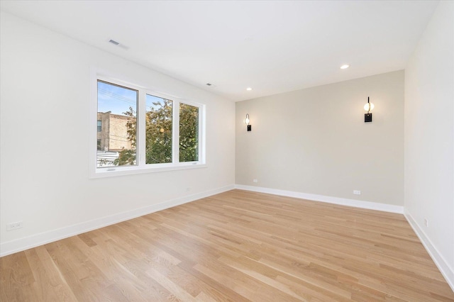 1542 W Highland Ave, Chicago, IL 60660 - empty room featuring light wood finished floors, baseboards, and recessed lighting