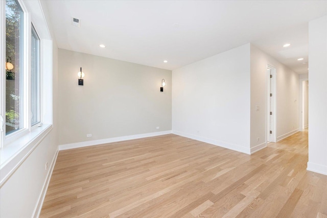 1542 W Highland Ave, Chicago, IL 60660 - spare room featuring light wood-style flooring, baseboards, and recessed lighting