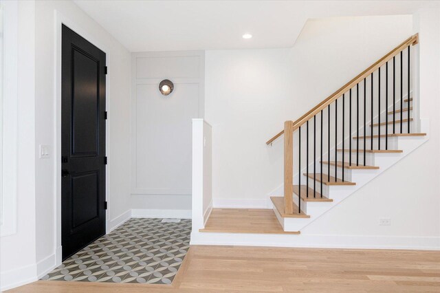 1542 W Highland Ave, Chicago, IL 60660 - foyer entrance featuring baseboards, stairs, and recessed lighting