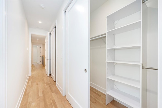 1542 W Highland Ave, Chicago, IL 60660 - hallway with light wood-style floors, recessed lighting, and baseboards