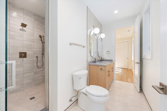 1542 W Highland Ave, Chicago, IL 60660 - full bath featuring tile patterned flooring, a tile shower, toilet, vanity, and recessed lighting