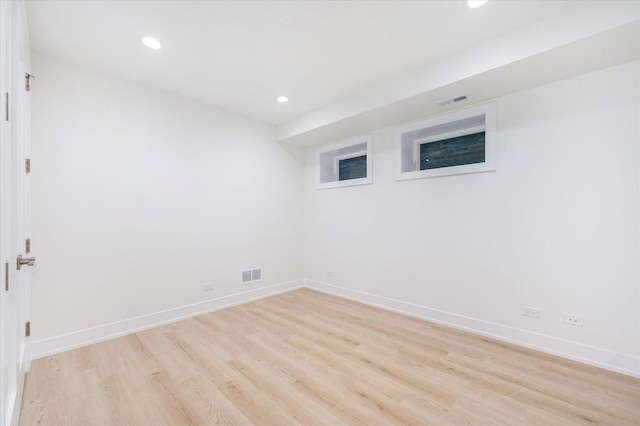 1542 W Highland Ave, Chicago, IL 60660 - unfurnished room featuring light wood-style flooring, recessed lighting, and baseboards