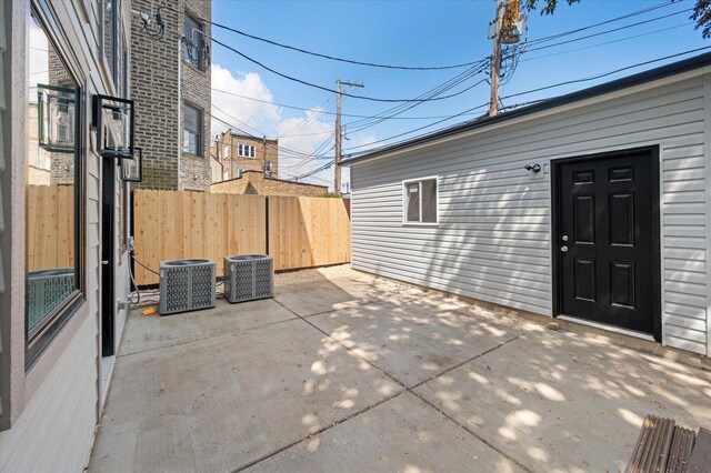 1542 W Highland Ave, Chicago, IL 60660 - view of patio / terrace featuring fence and central AC unit