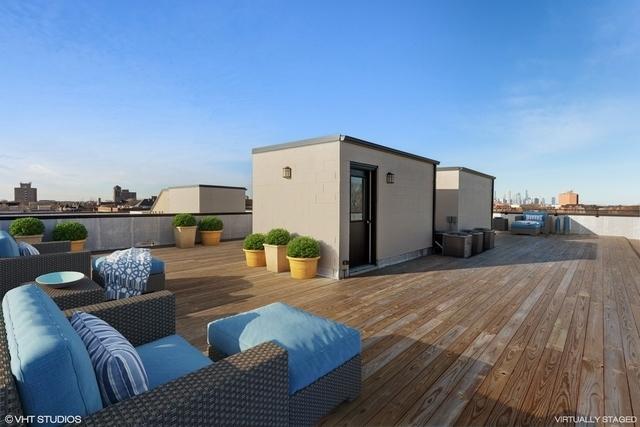 1203 E 46th St Unit 4N, Chicago, IL 60653 - wooden deck with an outdoor hangout area