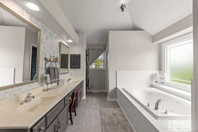 24006 Skyler Ln, Plainfield, IL 60586 - bathroom with a garden tub, double vanity, and lofted ceiling