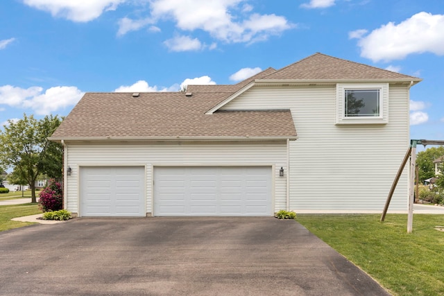 24006 Skyler Ln, Plainfield, IL 60586 - view of side of property with driveway, a shingled roof, a yard, and a garage