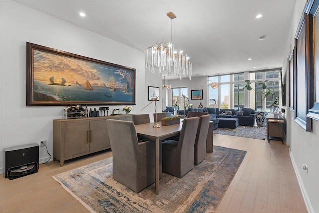 2773 N Hampden Ct Unit Ph03, Chicago, IL 60614 - dining area with a chandelier, wood finished floors, and recessed lighting