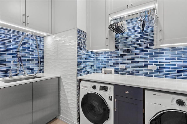 2773 N Hampden Ct Unit Ph03, Chicago, IL 60614 - washroom featuring washer / dryer and cabinet space
