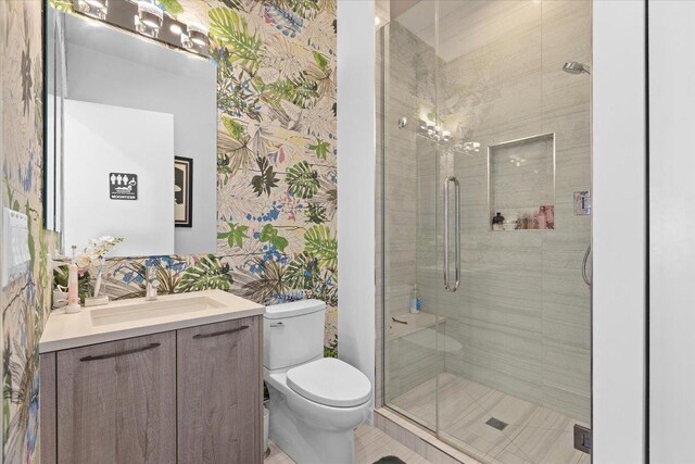 2773 N Hampden Ct Unit Ph03, Chicago, IL 60614 - full bathroom featuring wallpapered walls, vanity, and a stall shower
