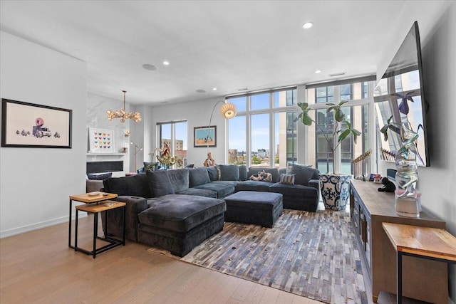 2773 N Hampden Ct Unit Ph03, Chicago, IL 60614 - living area with wood finished floors, a chandelier, and recessed lighting