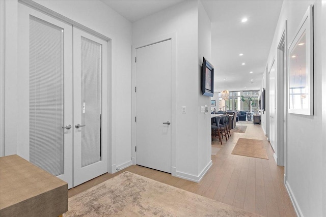 2773 N Hampden Ct Unit Ph03, Chicago, IL 60614 - hallway featuring wood finished floors, recessed lighting, and french doors