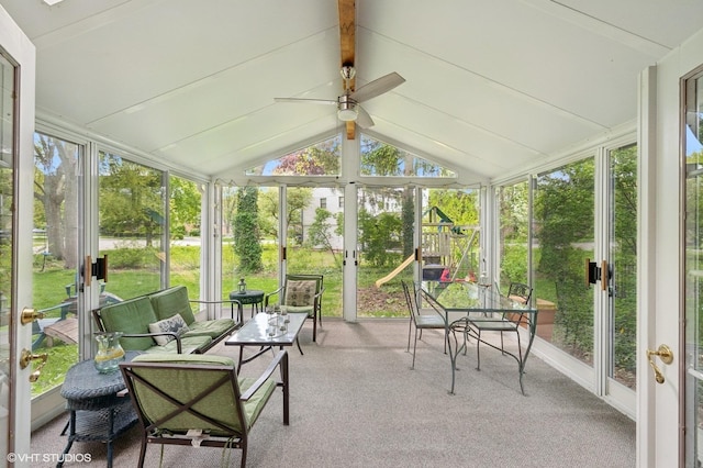 sunroom featuring a ceiling fan