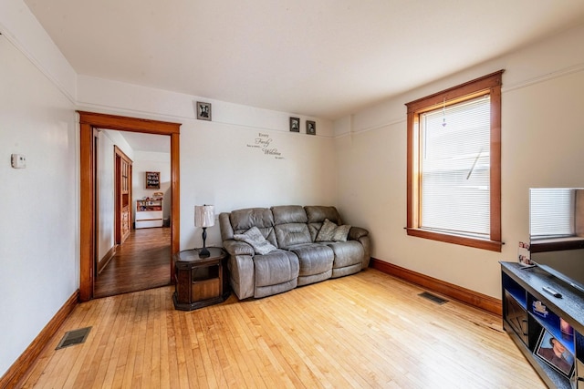 7601 W 60th Pl, Summit, IL 60501 - living area with light wood-style floors and baseboards