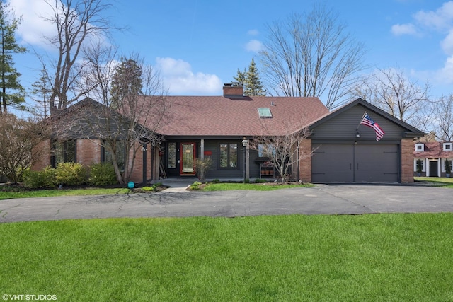 3300 Overland Pass, Northbrook, IL 60062 - view of front of property featuring brick siding, driveway, and a front lawn