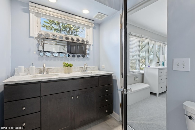 3300 Overland Pass, Northbrook, IL 60062 - bathroom featuring double vanity, baseboards, and crown molding