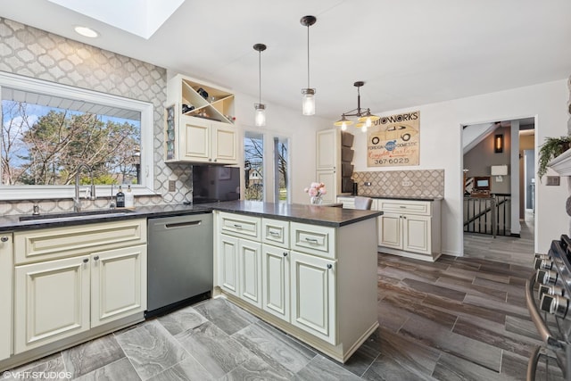 3300 Overland Pass, Northbrook, IL 60062 - kitchen with a sink, cream cabinets, stainless steel dishwasher, dark countertops, and recessed lighting