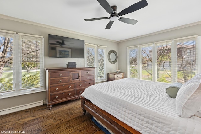 3300 Overland Pass, Northbrook, IL 60062 - bedroom featuring baseboard heating, crown molding, dark wood-type flooring, a ceiling fan, and baseboards