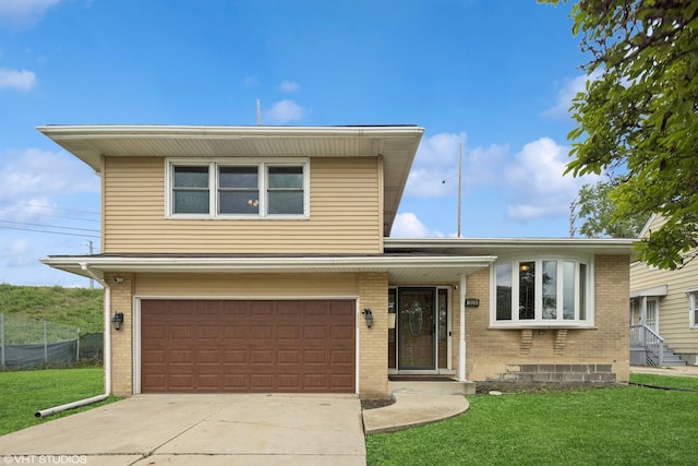 1826 Coolidge Ave, Berkeley, IL 60163 - split level home with a garage, brick siding, and concrete driveway