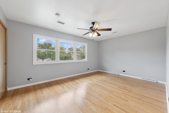 1826 Coolidge Ave, Berkeley, IL 60163 - unfurnished room featuring ceiling fan, baseboards, and light wood-style floors
