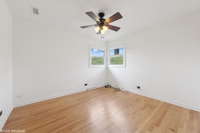 1826 Coolidge Ave, Berkeley, IL 60163 - empty room with light wood-style floors, baseboards, and a ceiling fan