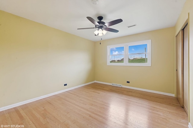 1826 Coolidge Ave, Berkeley, IL 60163 - unfurnished bedroom featuring baseboards, light wood-type flooring, and a closet
