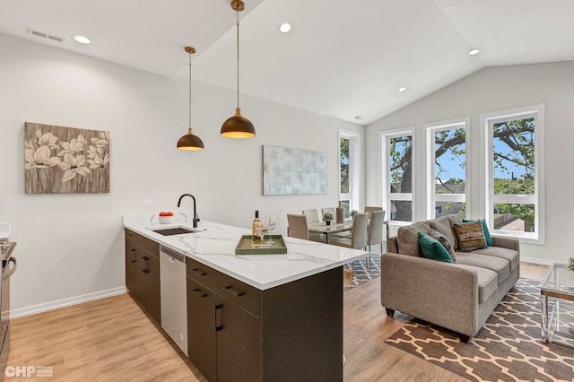 5201 S Wabash Ave, Chicago, IL 60615 - kitchen featuring a sink, stainless steel dishwasher, a peninsula, light wood finished floors, and vaulted ceiling