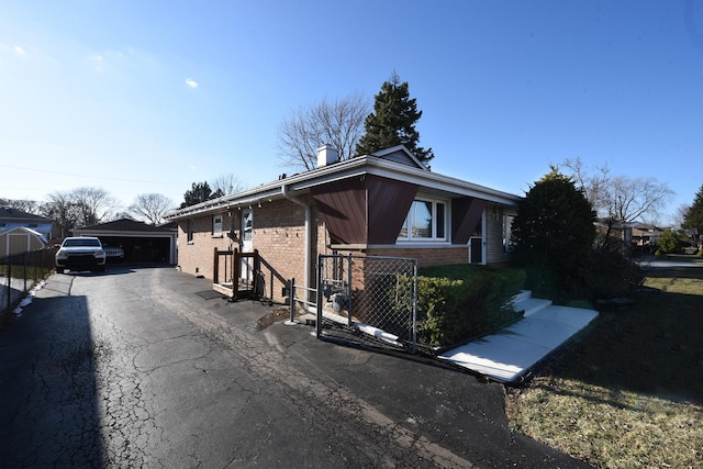 8848 Meade Ave, Oak Lawn, IL 60453 - ranch-style home featuring brick siding, a garage, fence, and a chimney
