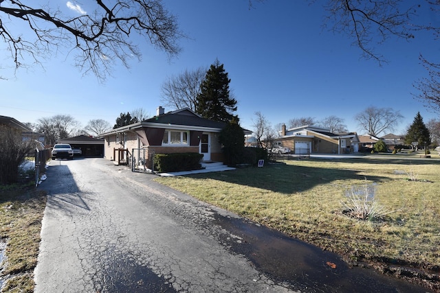8848 Meade Ave, Oak Lawn, IL 60453 - bungalow-style house featuring a front lawn and a chimney